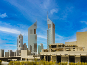 The Emirates Towers is a building complex in Dubai that contains the Emirates Office Tower and Jumeirah Emirates Towers Hotel. The two towers, which rise to 355 m and 309 m, respectively, stand as the 42nd and 100th tallest buildings in the world