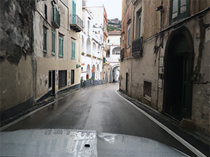 Driving on the narrow road in the city