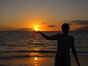 An image of sunset at Maui beach